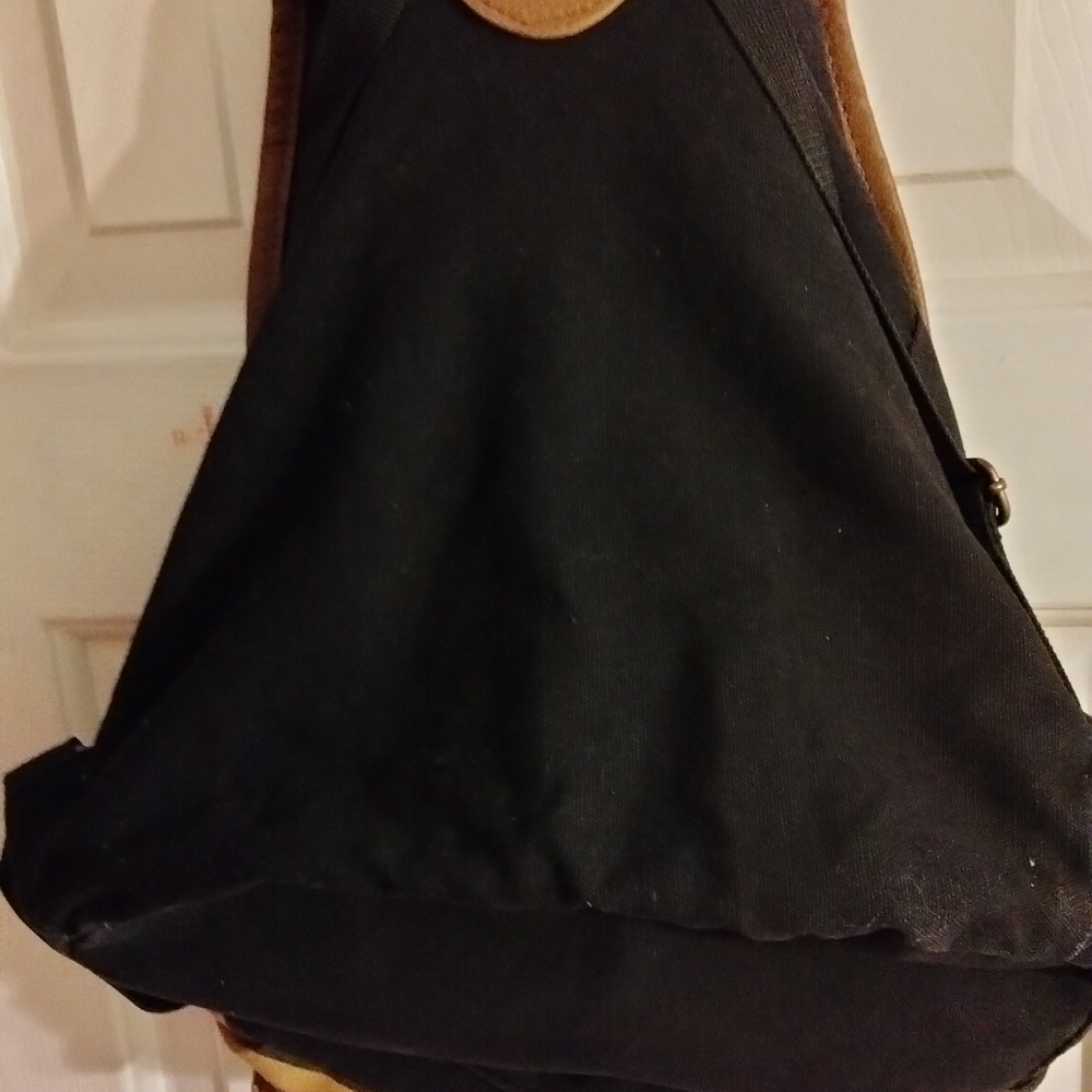 This Harry Potter Hufflepuff Varsity Backpack in black, tan, and gold is a must- - Picture 2 of 7